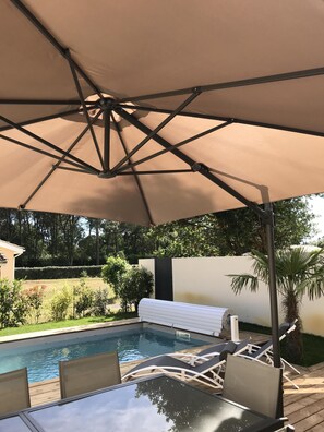 Alberca al aire libre y alberca climatizada