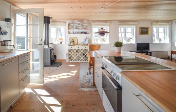 Fridge, stovetop, coffee/tea maker, cookware/dishes/utensils