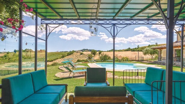 A covered outdoor seating area with a pool and a view of the surrounding landscape. - Gorgeous home in Barchi PU with private swimming pool, can be inside or outside (Barchi PU)