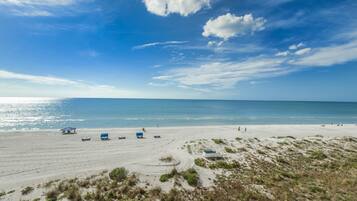 On the beach, beach towels