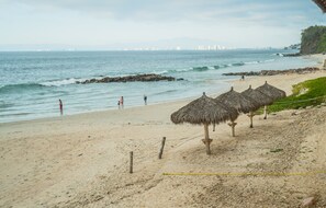 On the beach, sun loungers, beach towels