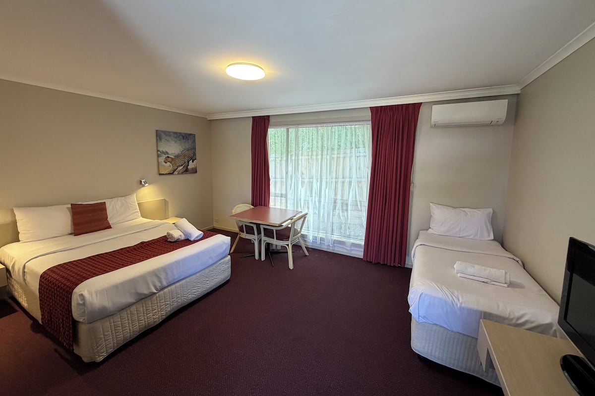 Blackout drapes, iron/ironing board, WiFi (free), bed sheets