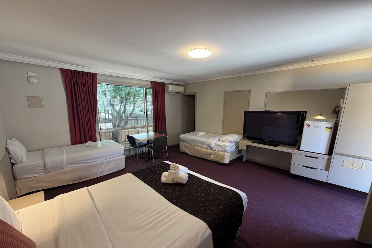 Family Room | Blackout drapes, iron/ironing board, WiFi (free), bed sheets
