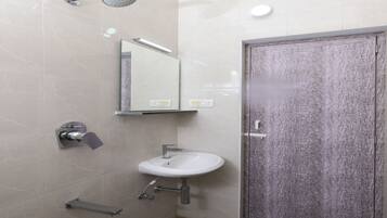 Shower, rainfall showerhead, towels