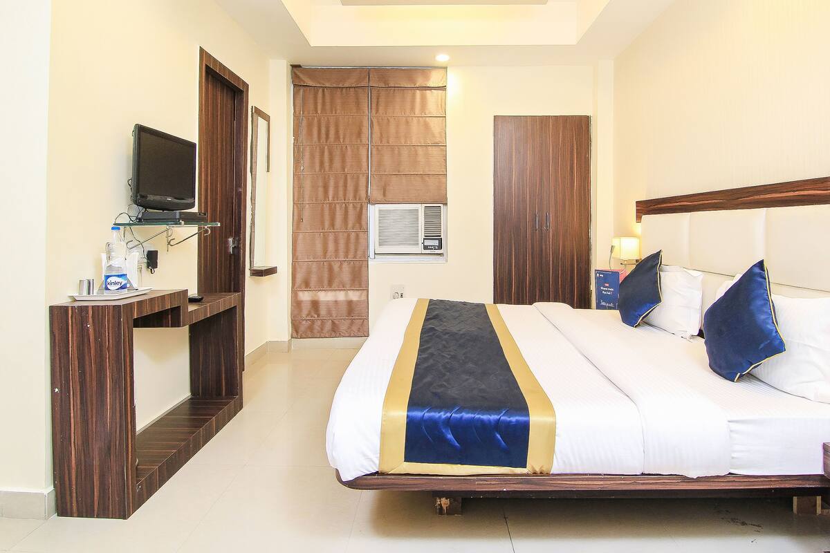 Camera Deluxe con letto matrimoniale o 2 letti singoli, 1 letto king | Accesso in sedia a rotelle