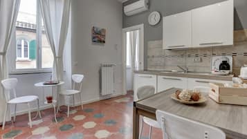 Appartement, 1 chambre | Coin séjour