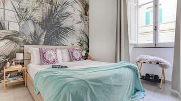 Appartamento, 2 camere da letto, vista giardino | Una scrivania, postazione laptop, Wi-Fi gratuito, lenzuola