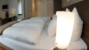 Premium bedding, down comforters, pillowtop beds, minibar