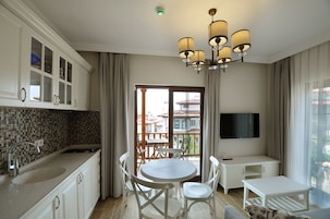 Apartment, Garden View | Living area | LCD TV