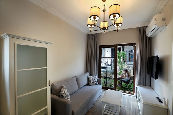 Apartment, Garden View | Living area | LCD TV