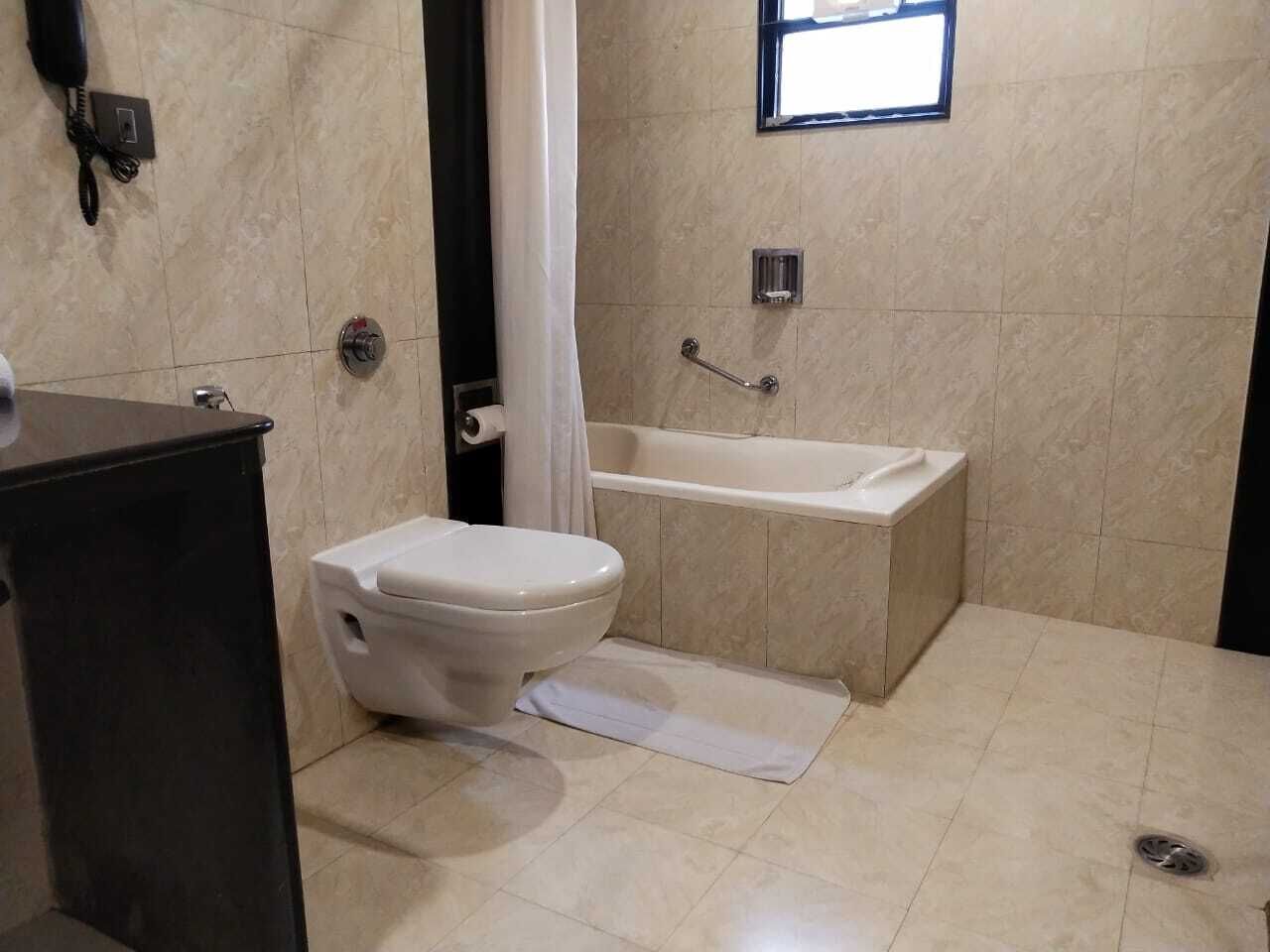 Prince Suite  | Bathroom | Spring water bathtub, rainfall showerhead, free toiletries, hair dryer