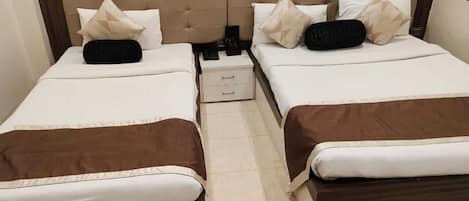 Premium bedding, in-room safe, blackout drapes, soundproofing