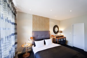 Room | Hypo-allergenic bedding, down comforters, desk, blackout drapes