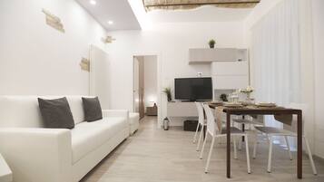 Lägenhet - 1 sovrum | Vardagsrum | Platt-tv