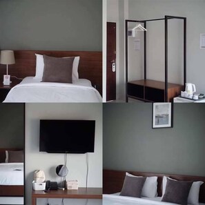 A hotel room with a bed, a TV, a bedside table with a lamp, and a coat rack. - The Zen Hotel Yasothon (Yasothon)
