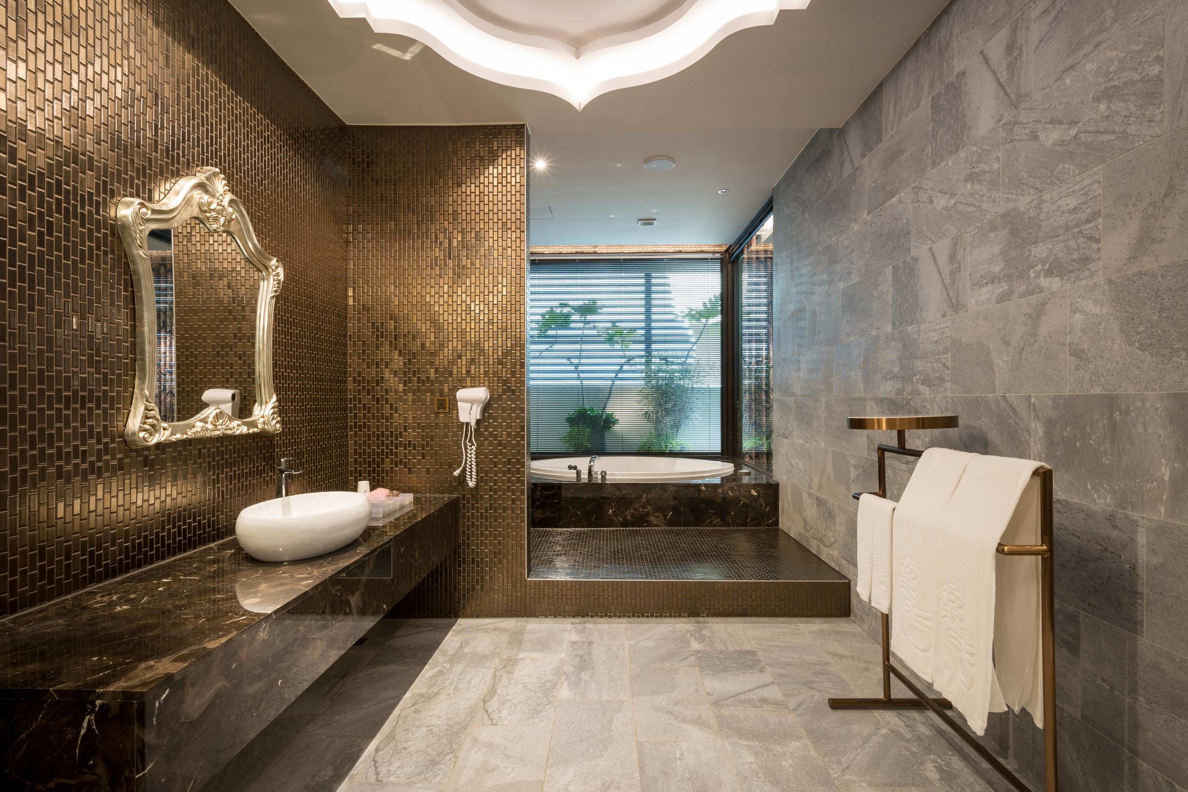 comfort double room | bathroom amenities | jetted bath, free toiletries, hair dryer, slippers