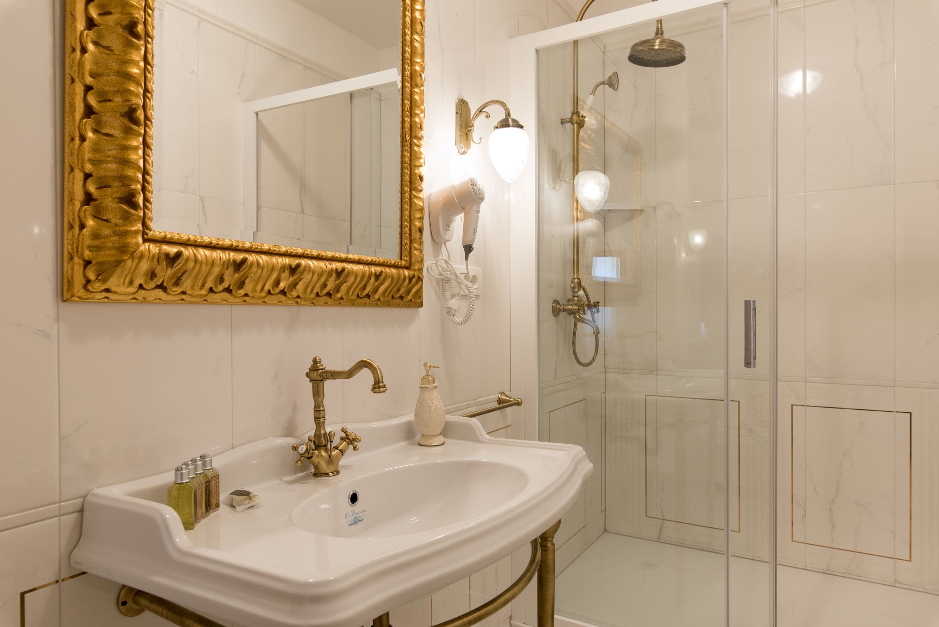 shower, free toiletries, hair dryer, towels