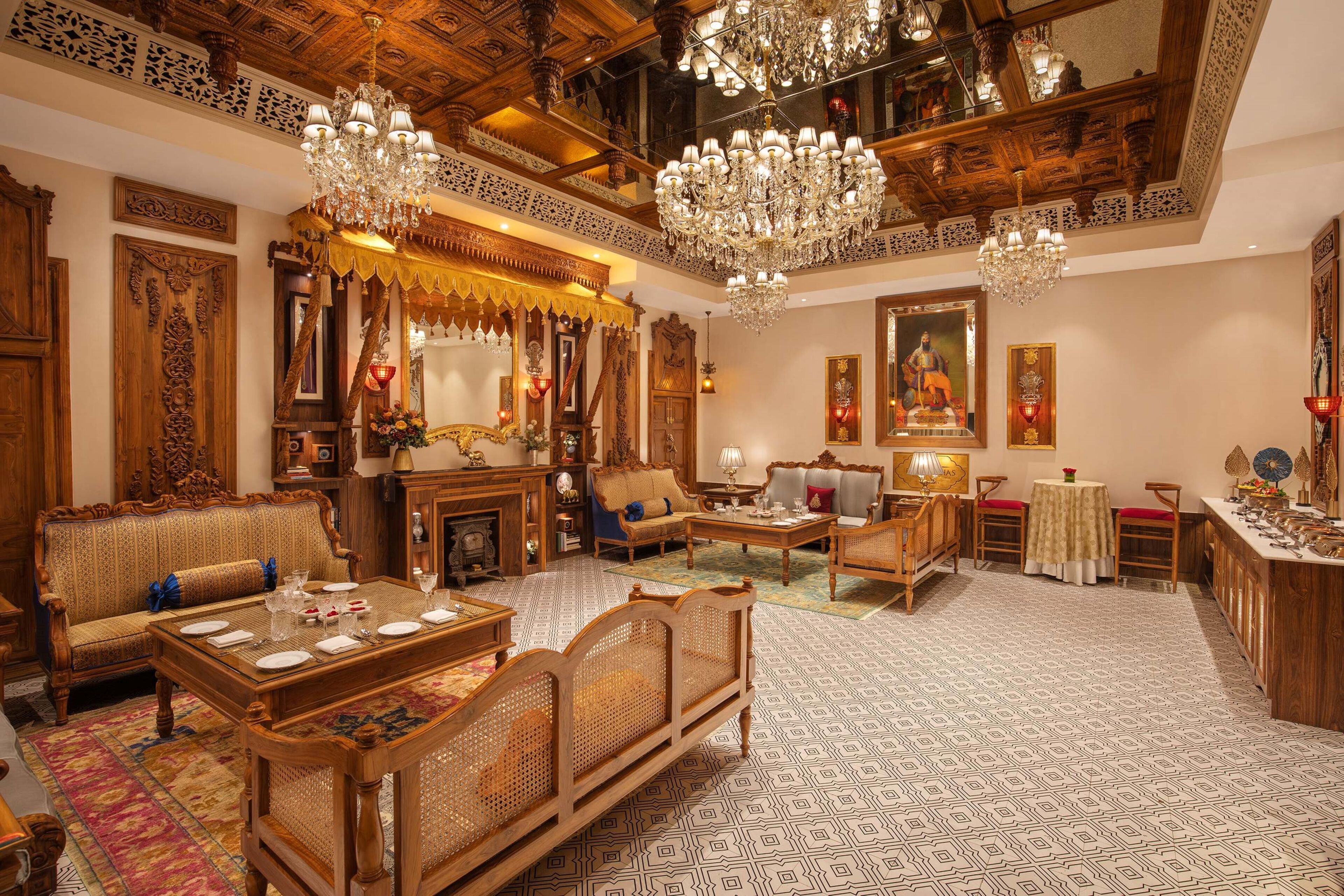 A traditional interior with ornate wooden furniture, chandeliers, and patterned carpets.