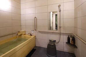 Shower, free toiletries, slippers, towels
