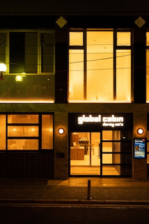 Front of property – evening/night. Global Cabin Yokohama Chukagai