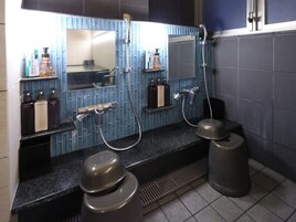 Shower, free toiletries, slippers, towels