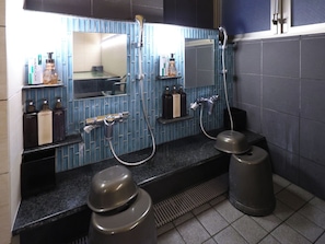 Shower, free toiletries, slippers, towels