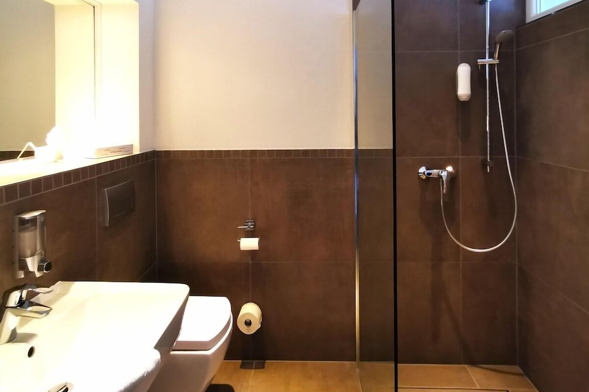Bathroom | Shower, free toiletries, hair dryer, towels