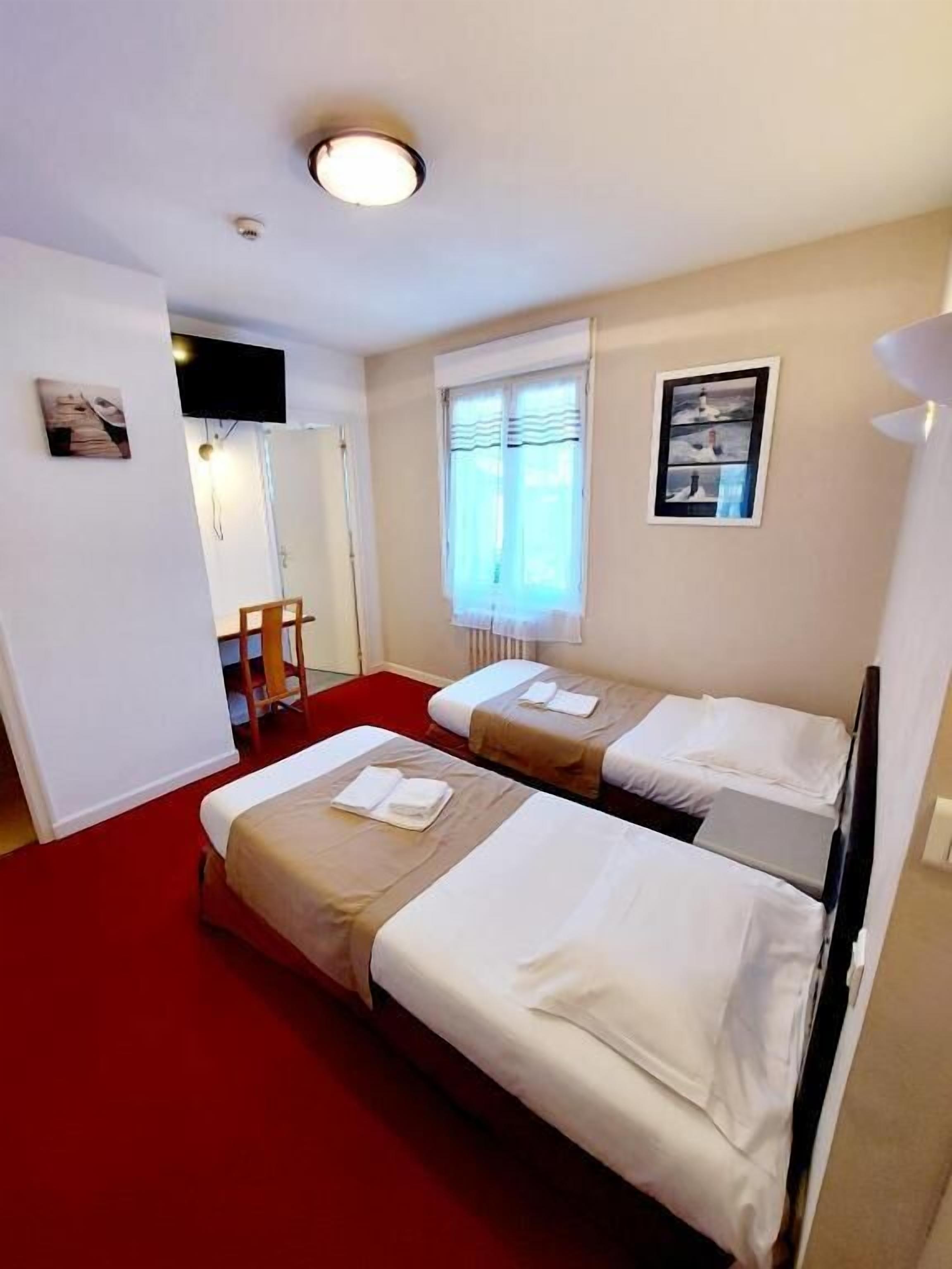 individually decorated, desk, blackout curtains, iron/ironing board