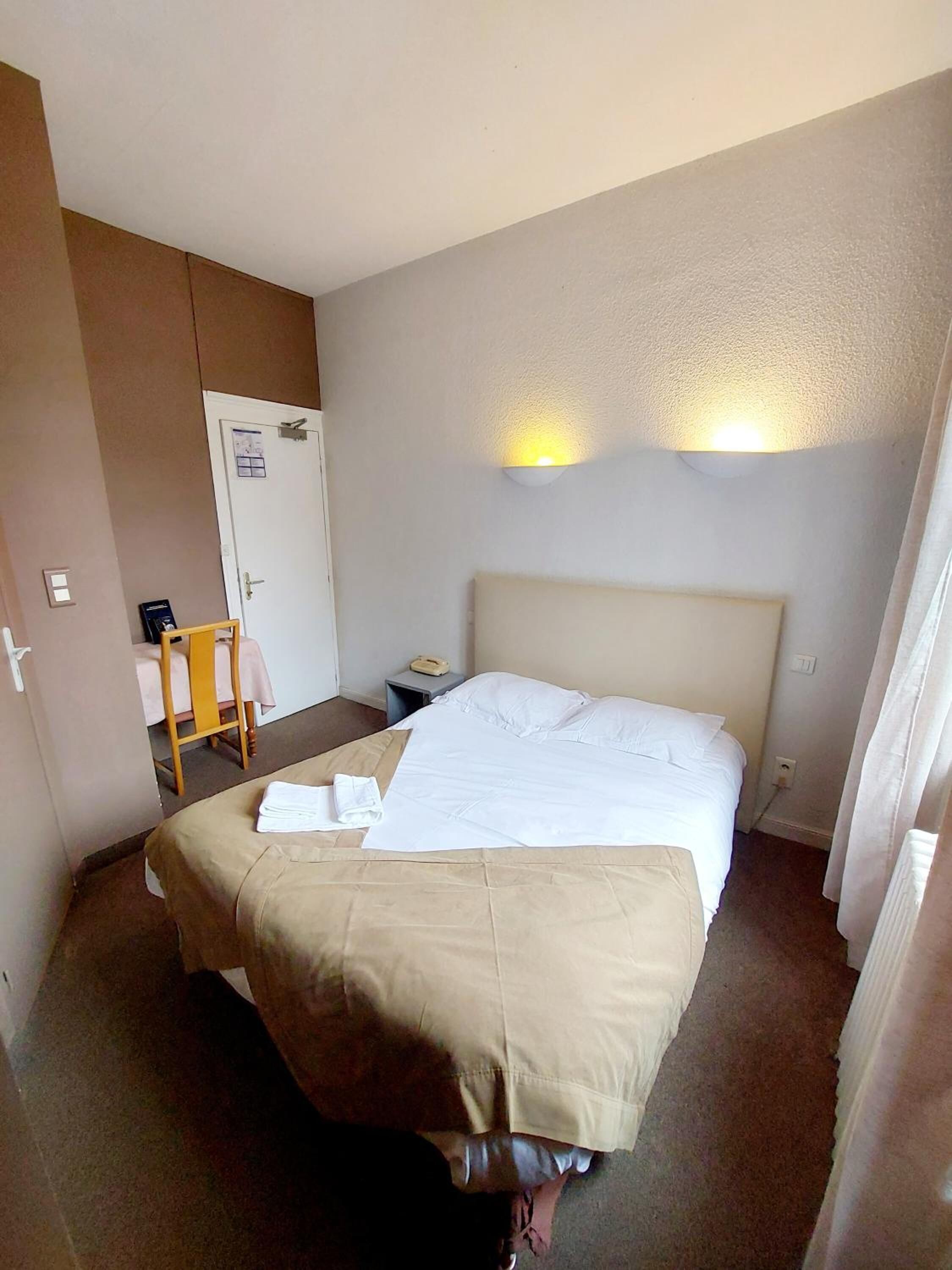 individually decorated, desk, blackout curtains, iron/ironing board