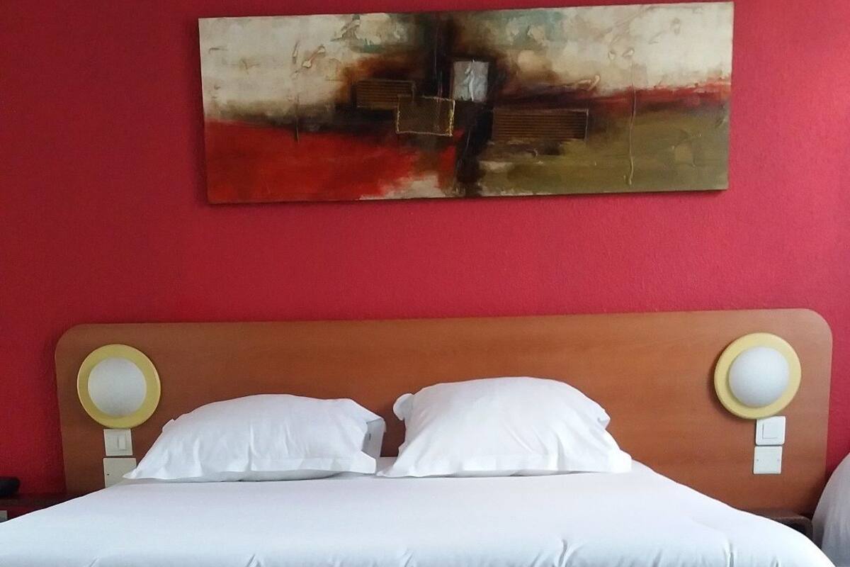 Double Room | Desk, blackout drapes, iron/ironing board (on request), cribs (free)