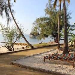 On the beach, sun-loungers, beach umbrellas, beach towels