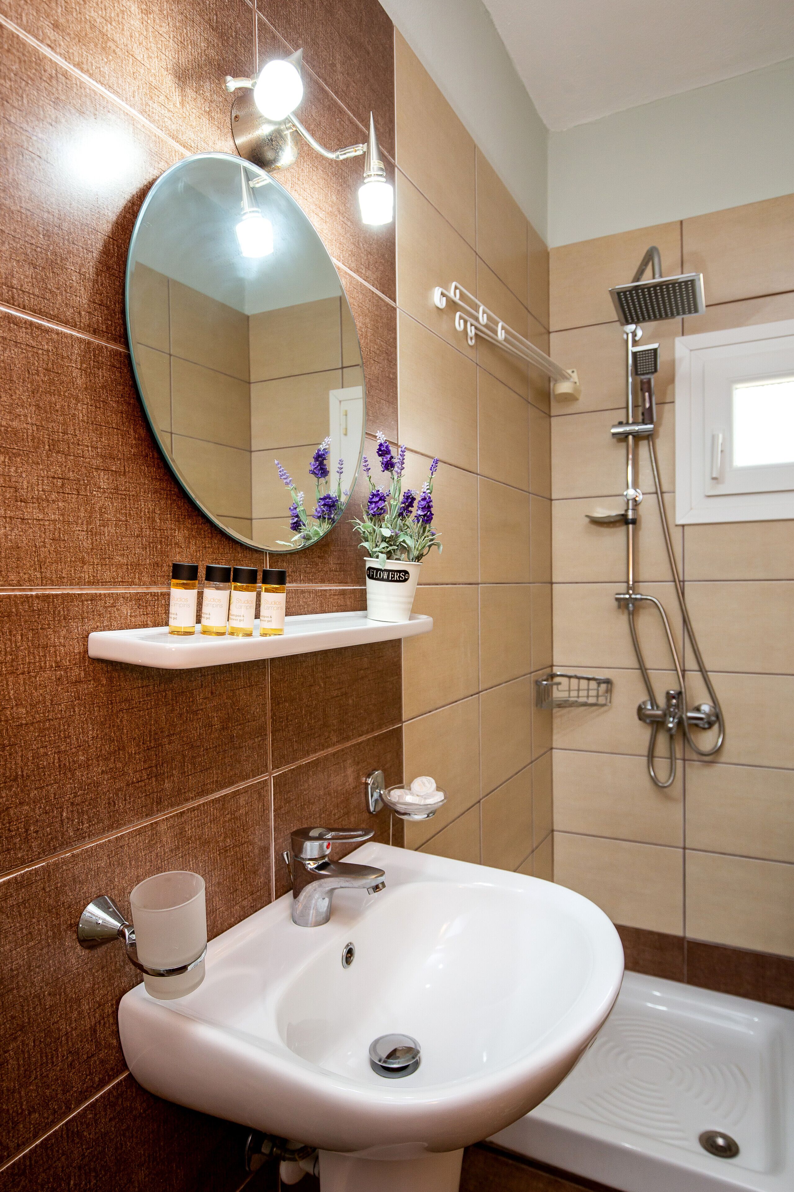Studio, Non Smoking (4 Adults) | Bathroom | Shower, free toiletries, hair dryer, towels