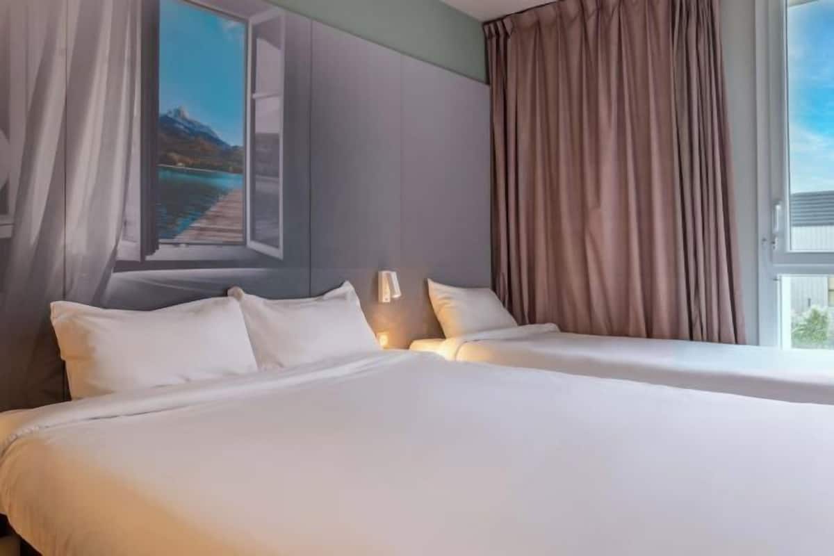 Premium bedding, desk, blackout curtains, soundproofing