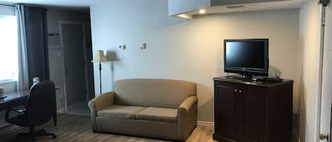 Standard Suite, Multiple Beds | Living area | 40-inch flat-screen TV with digital channels, Netflix