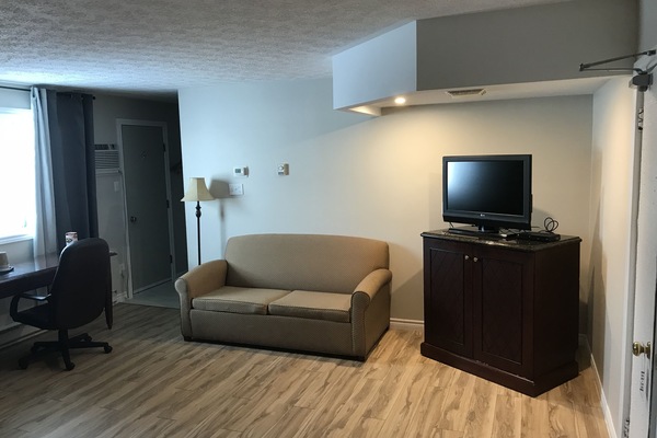 Standard Suite, Multiple Beds | Living area | 40-inch flat-screen TV with digital channels, Netflix