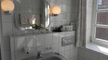 Shower, free toiletries, hair dryer, towels