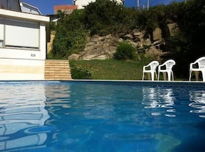 Outdoor pool, pool umbrellas, pool loungers