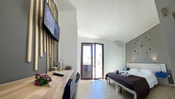 Deluxe Double Room, Sea View | Individually decorated, desk, laptop workspace, blackout curtains