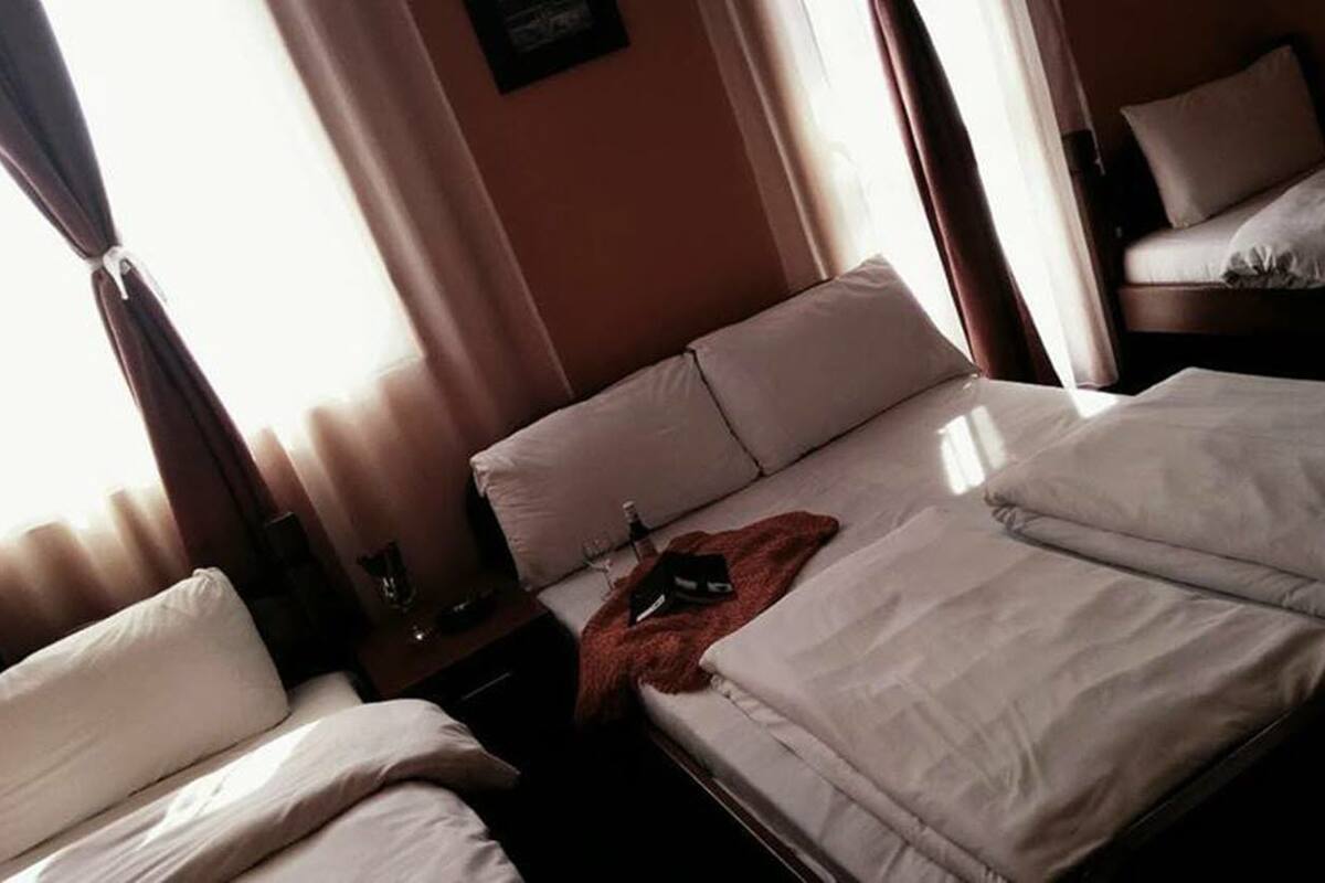 quadruple room | premium bedding, minibar, in-room safe, desk