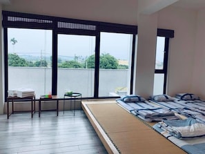 Family Room | Premium bedding, desk, blackout drapes, WiFi - Here is BNB (Zhongpu)
