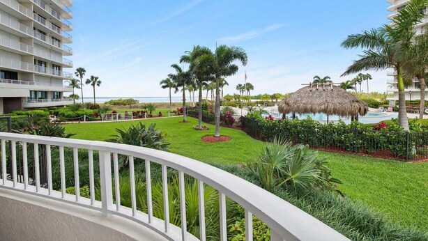 Property grounds - Beachfront 2BR/2BA condo with pool, Wi‑Fi, and heated pool access. (Marco Island)