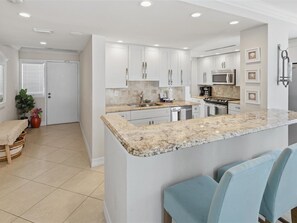 Coffee/tea maker, fridge, microwave, oven