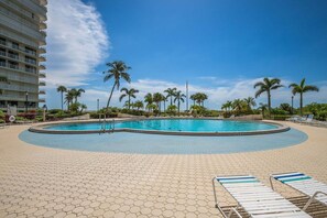 A heated pool - Beachfront 2BR/2BA condo in Marco Island with pool, WiFi, and kitchen. (Marco Island)