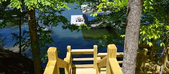 Exclusive Smith Lake Slice of Heaven  in the Gated Point William Development. 