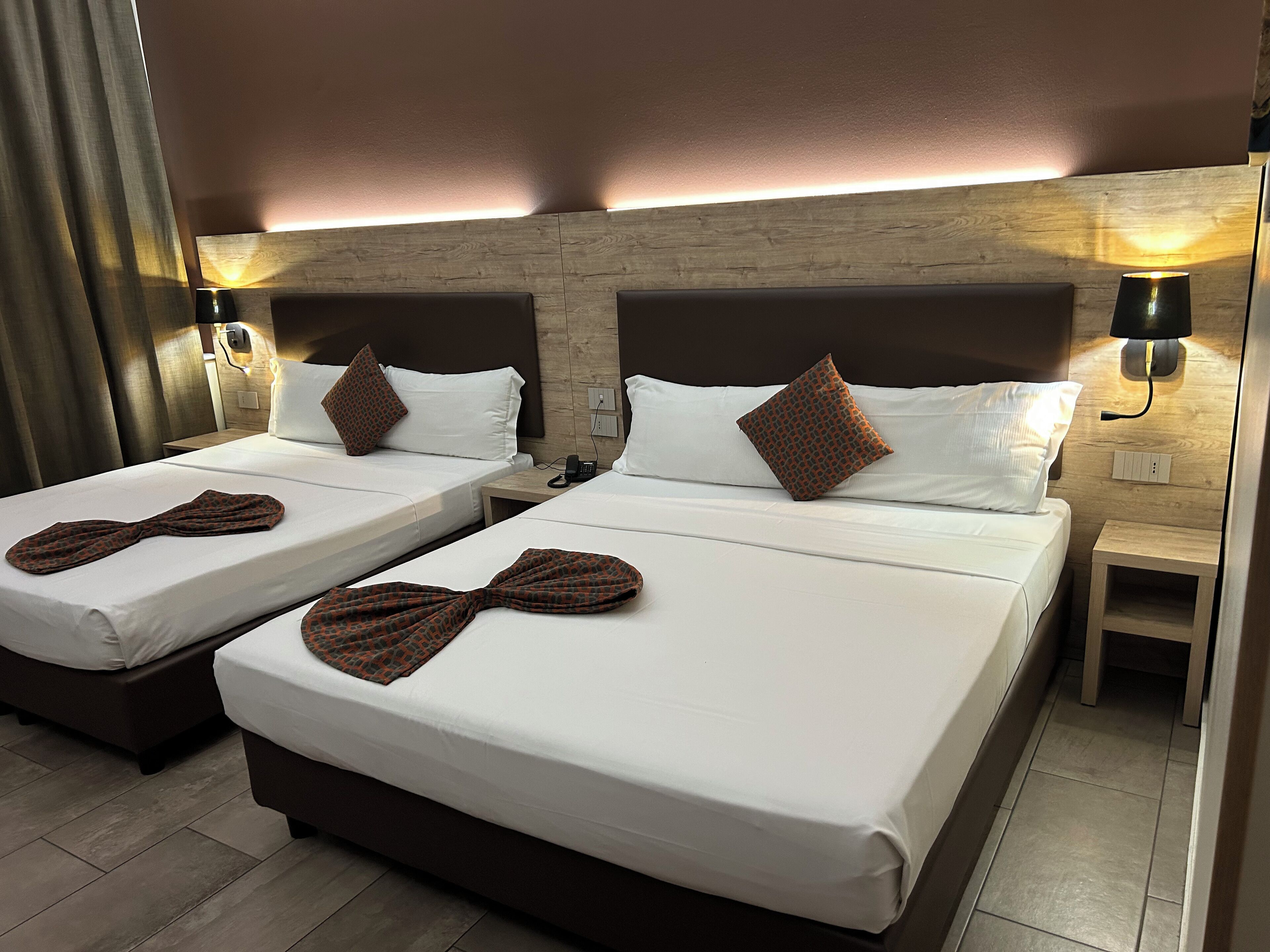 Standard Quadruple Room, Non Smoking | Down duvets, in-room safe, individually furnished, desk