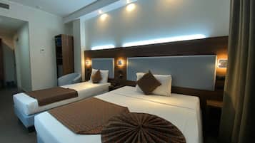 Standard Triple Room, Multiple Beds, Non Smoking | Down duvets, minibar, in-room safe, individually furnished