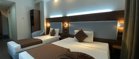 Standard Triple Room, Multiple Beds, Non Smoking | Down comforters, minibar, in-room safe, individually furnished