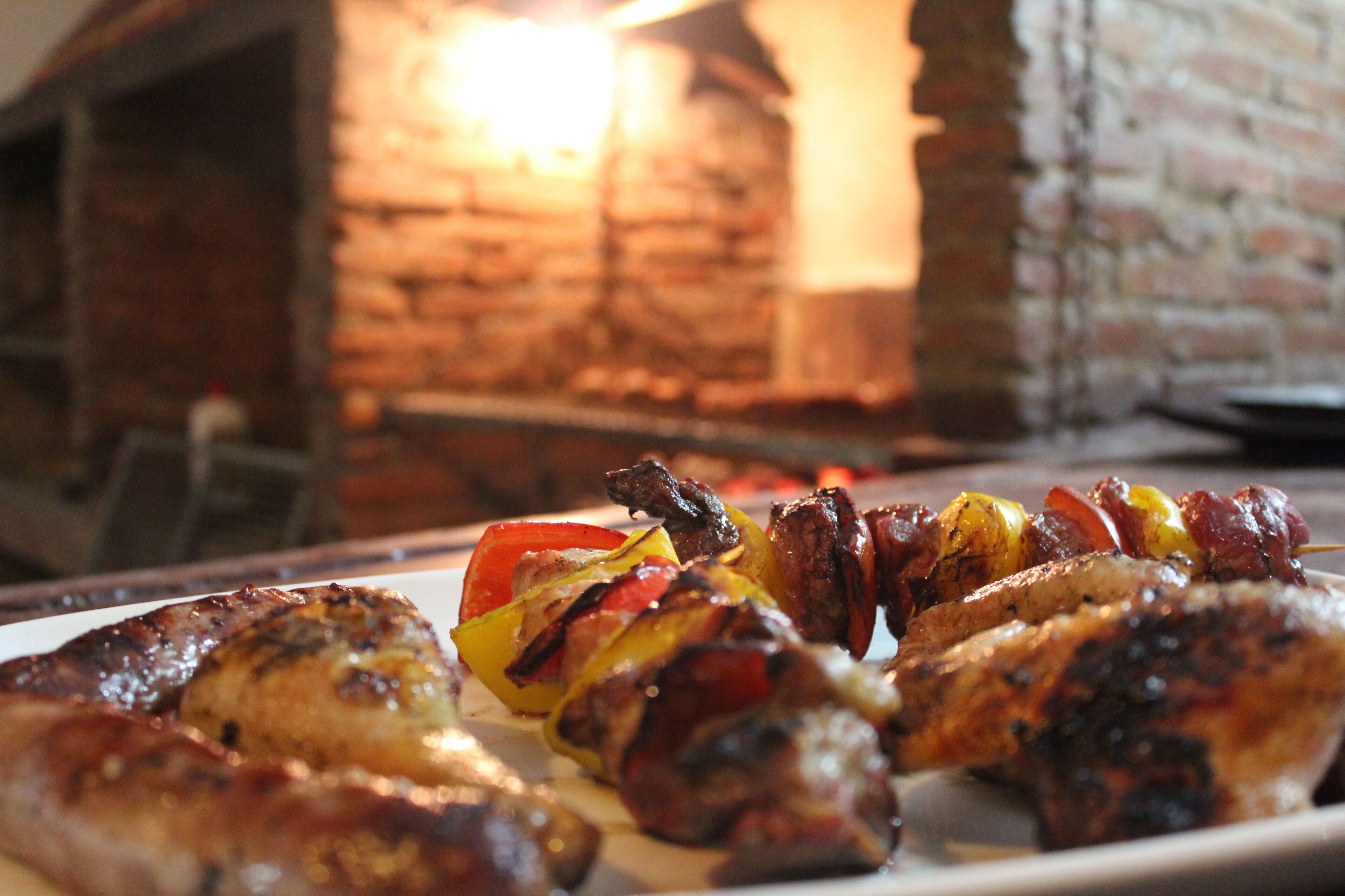 A plate of grilled meat and vegetables.