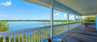 Seaside Retreat: Waterfront Home with private heated pool & lush landscaping