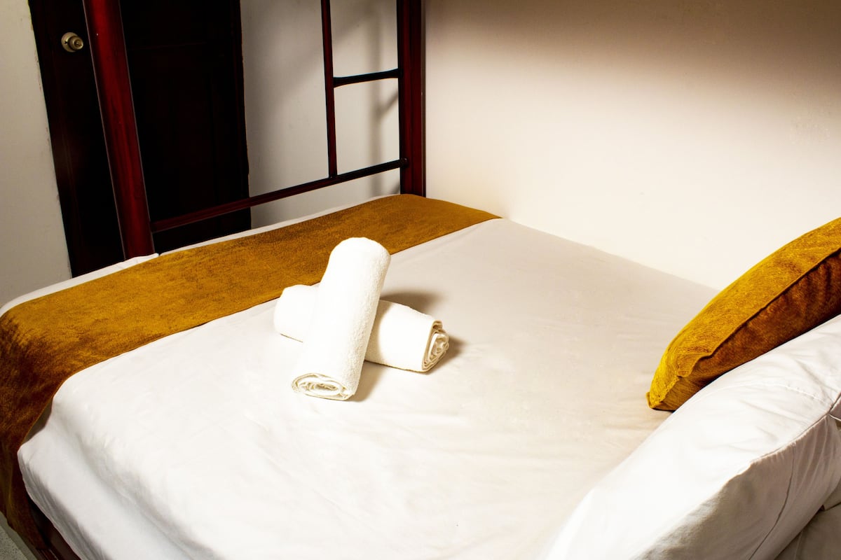 Classic Triple Room, Mixed Dorm | Premium bedding, down duvets, in-room safe, individually furnished
